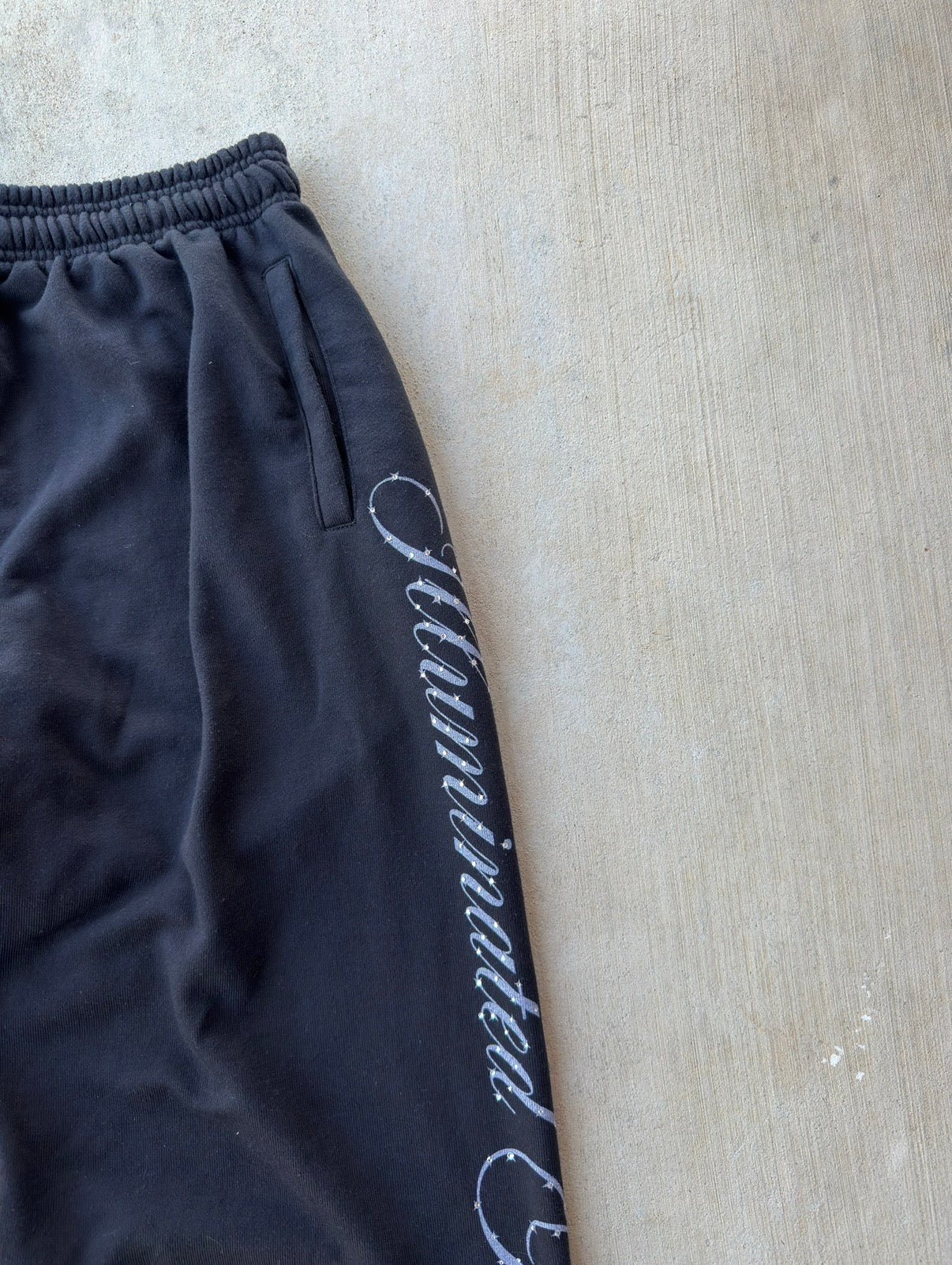 ILLUMINATED BY KALONIC BLACK SWEATS